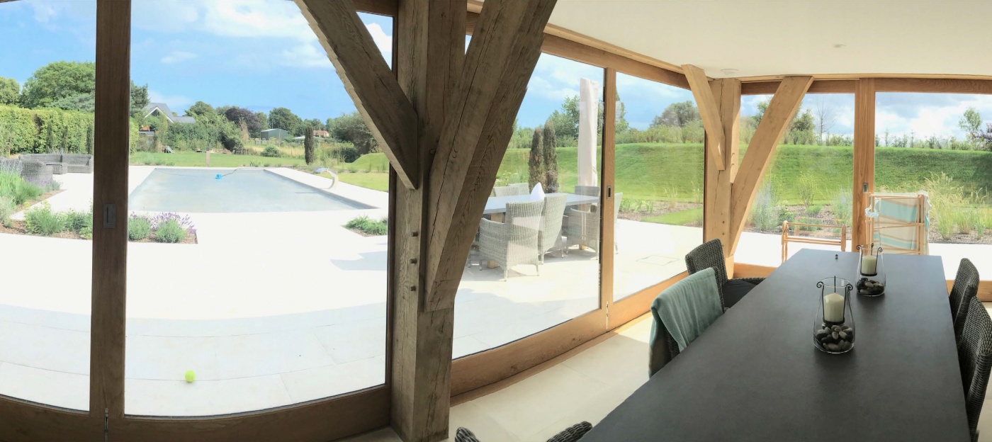 Sliding doors to Boat Shed and View of pool and old river bank