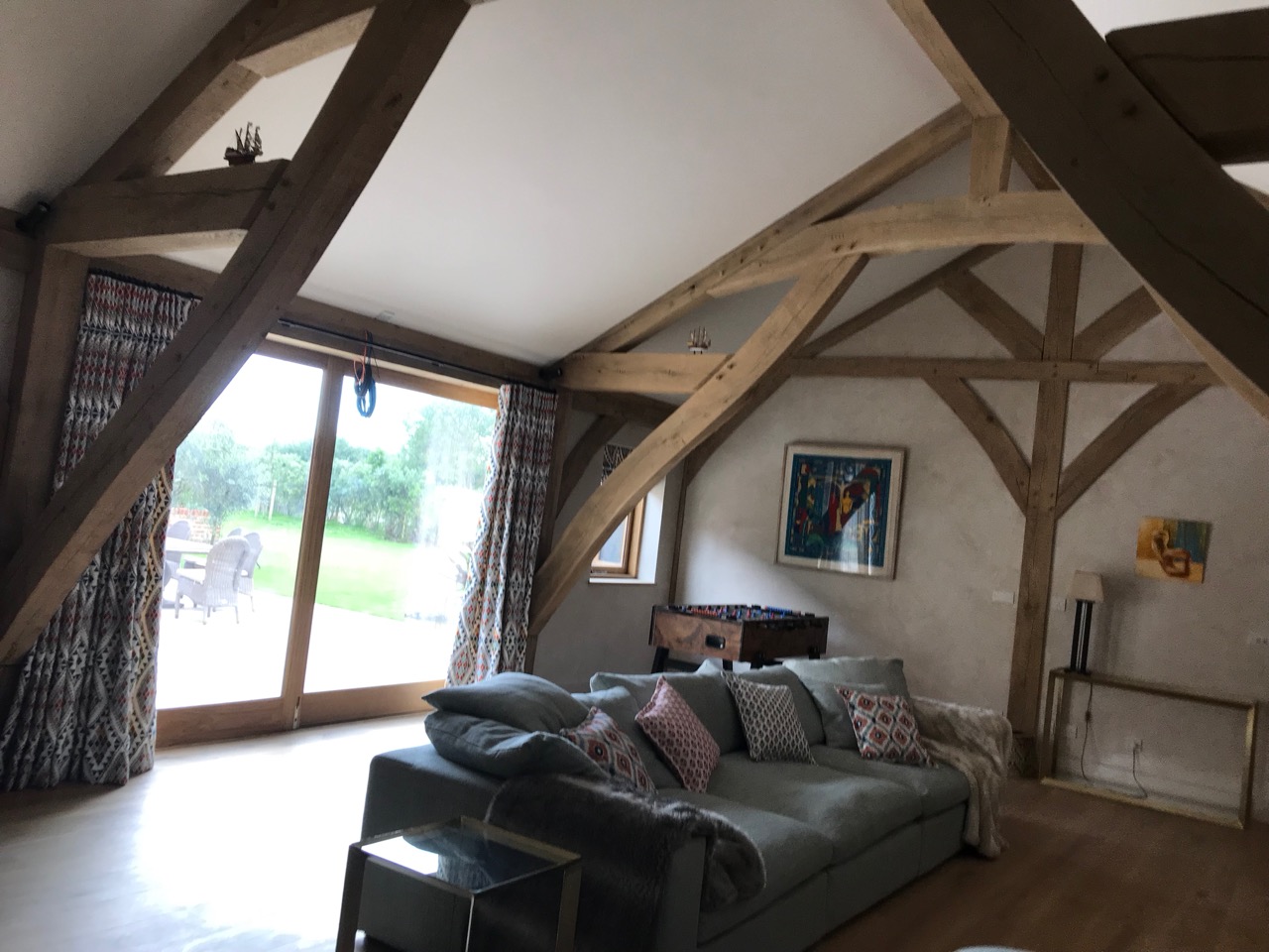 Ship shaped timbers in new timber frame Hall