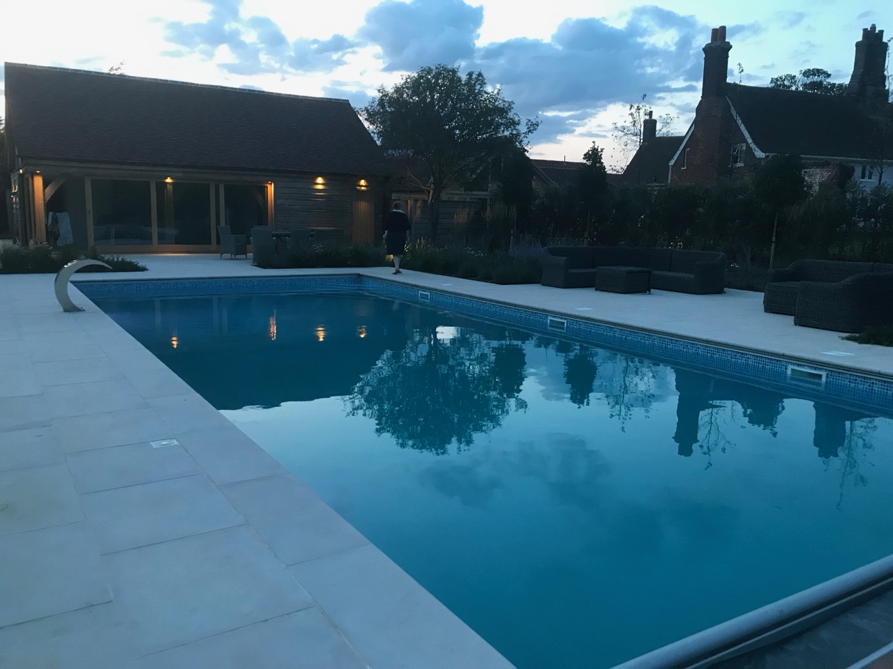 View of Aldeburgh hall reflected in pool where old river bank was located.